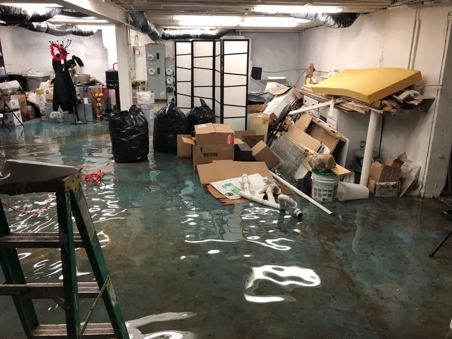 Flooded basement being cleaned up in a Marietta, GA home