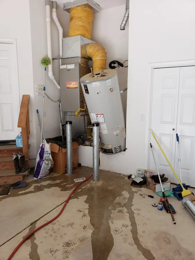 Water heater failure flooding in a Marietta, GA garage